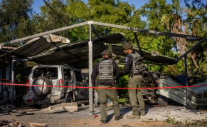  The damage caused to a house and the surrounding from a rocket fired from the Gaza Strip in a Moshav near the border with the Gaza Strip on August 7, 2022. 