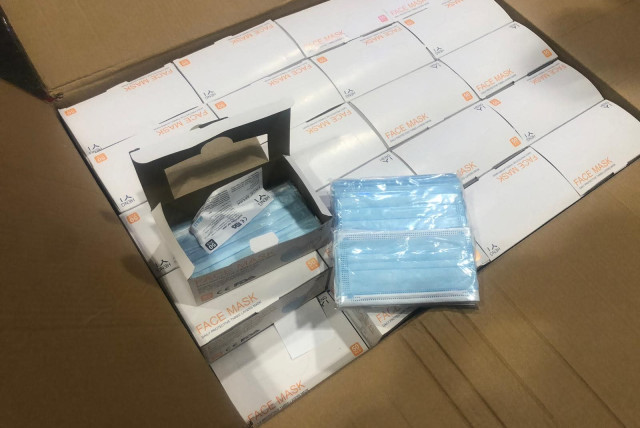The US Department of Defense delivers one million surgical masks to be used by the IDF (photo credit: MINISTRY OF DEFENSE SPOKESPERSON'S OFFICE)