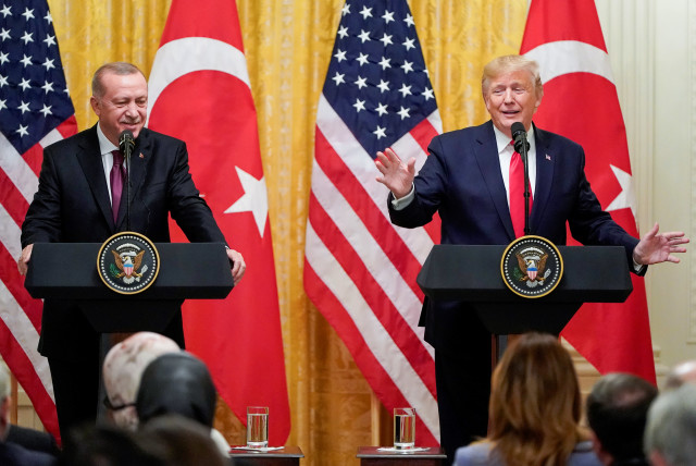 US President Donald Trump speaks next to Turkey's President Tayyip Erdogan during a joint news conference at the White House in Washington, US, November 13, 2019 (photo credit: JOSHUA ROBERTS / REUTERS)