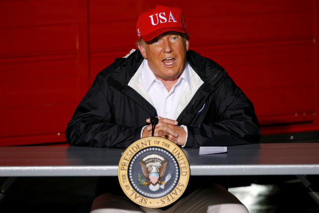 U.S. President Donald Trump speaks during a briefing at Lake Charles Fire House as he visits nearby areas damaged by Hurricane Laura in Lake Charles, Louisiana, U.S., August 29, 2020 (photo credit: REUTERS/TOM BRENNER)