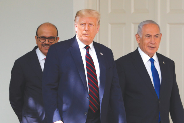 US PRESIDENT Donald Trump walks with Prime Minister Benjamin Netanyahu and UAE Foreign Minister Abdullah bin Zayed at the White House in Washington on September 15. (photo credit: REUTERS)