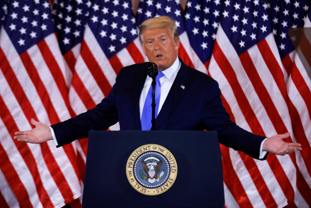 US President Donald Trump speaks about early results from the 2020 US presidential election in the East Room of the White House in Washington, US, November 4, 2020. (photo credit: CARLOS BARRIA / REUTERS)