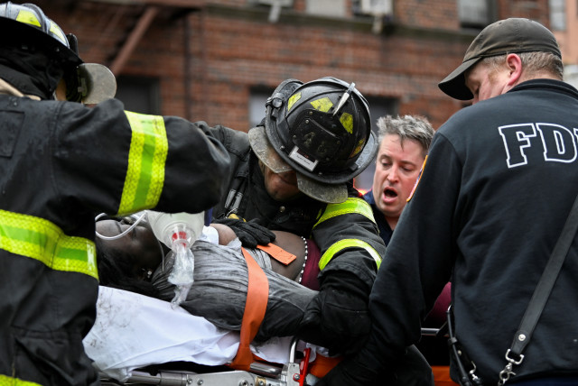 19, including nine children, dead in New York apartment building fire - The  Jerusalem Post