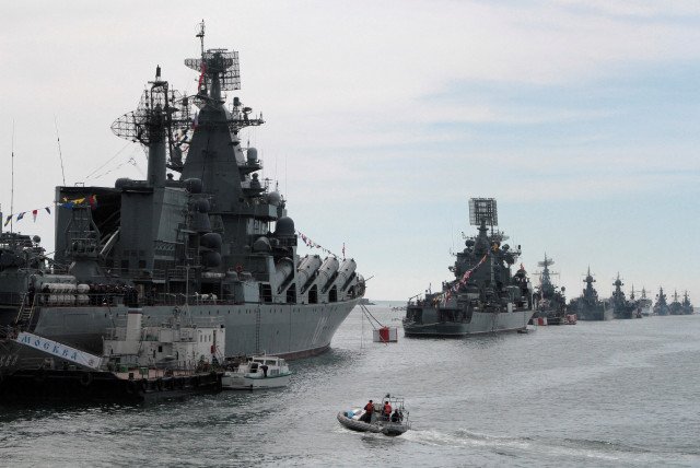  Russian Navy vessels are anchored in a bay of the Black Sea port of Sevastopol in Crimea May 8, 2014 (photo credit: REUTERS/STRINGER/FILE PHOTO)
