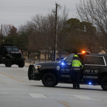 Law enforcement vehicles are seen in the area where a man has reportedly taken people hostage at a synagogue during services that were being streamed live, in Colleyville, Texas, US, January 15, 2022.