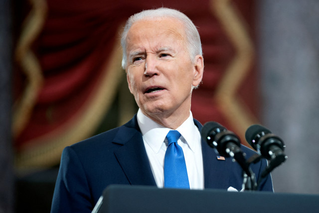 US President Joe Biden delivers remarks in the Statuary Hall of the US Capitol during a ceremony on the first anniversary of the January 6, 2021 attack on the US Capitol by supporters of former President Donald Trump in Washington, D.C., US, January 6, 2022.