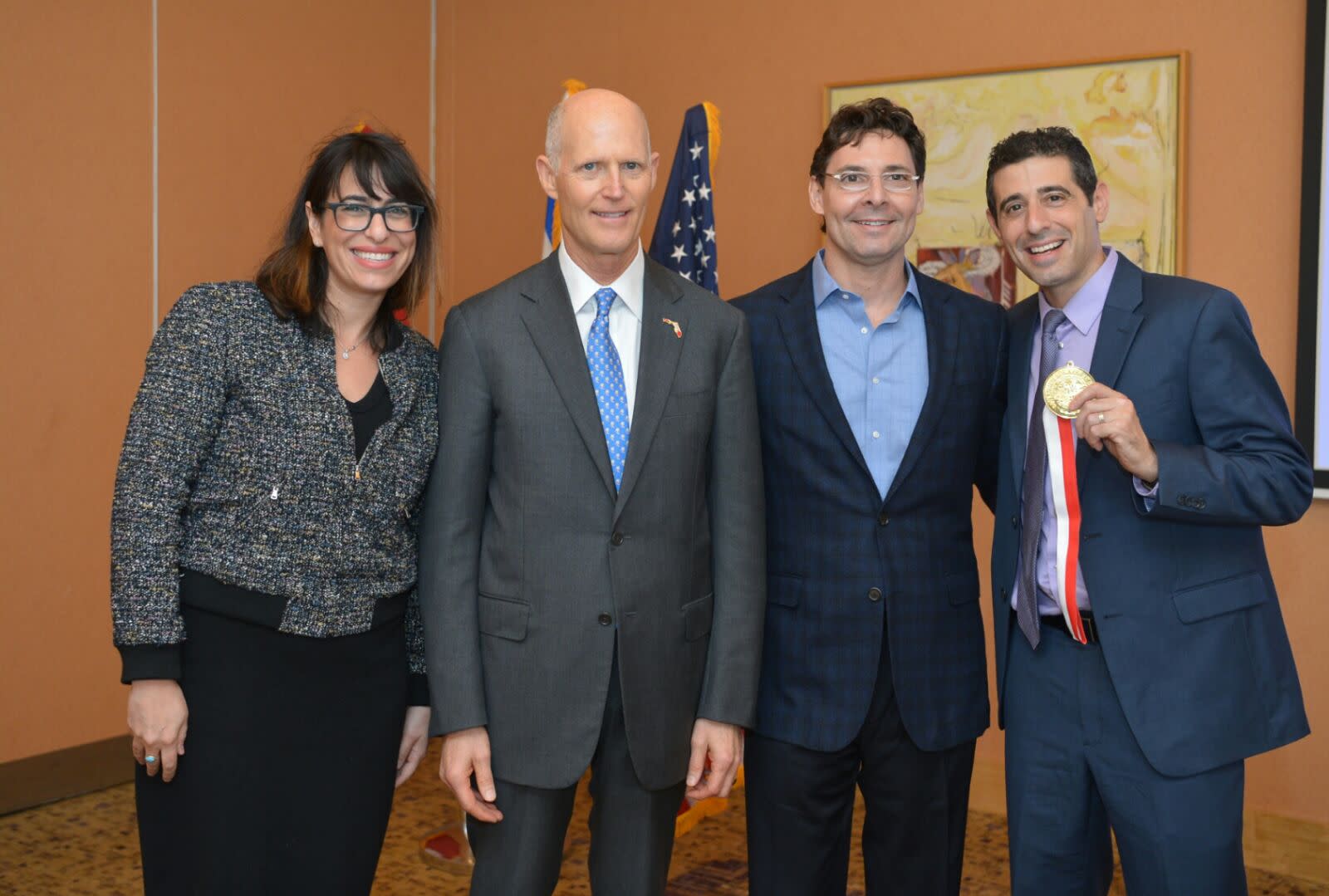 Scott gave an award on Monday to executives from Israeli aerospace company Stemrad, which has worked closely with Florida firms. (Courtesy)