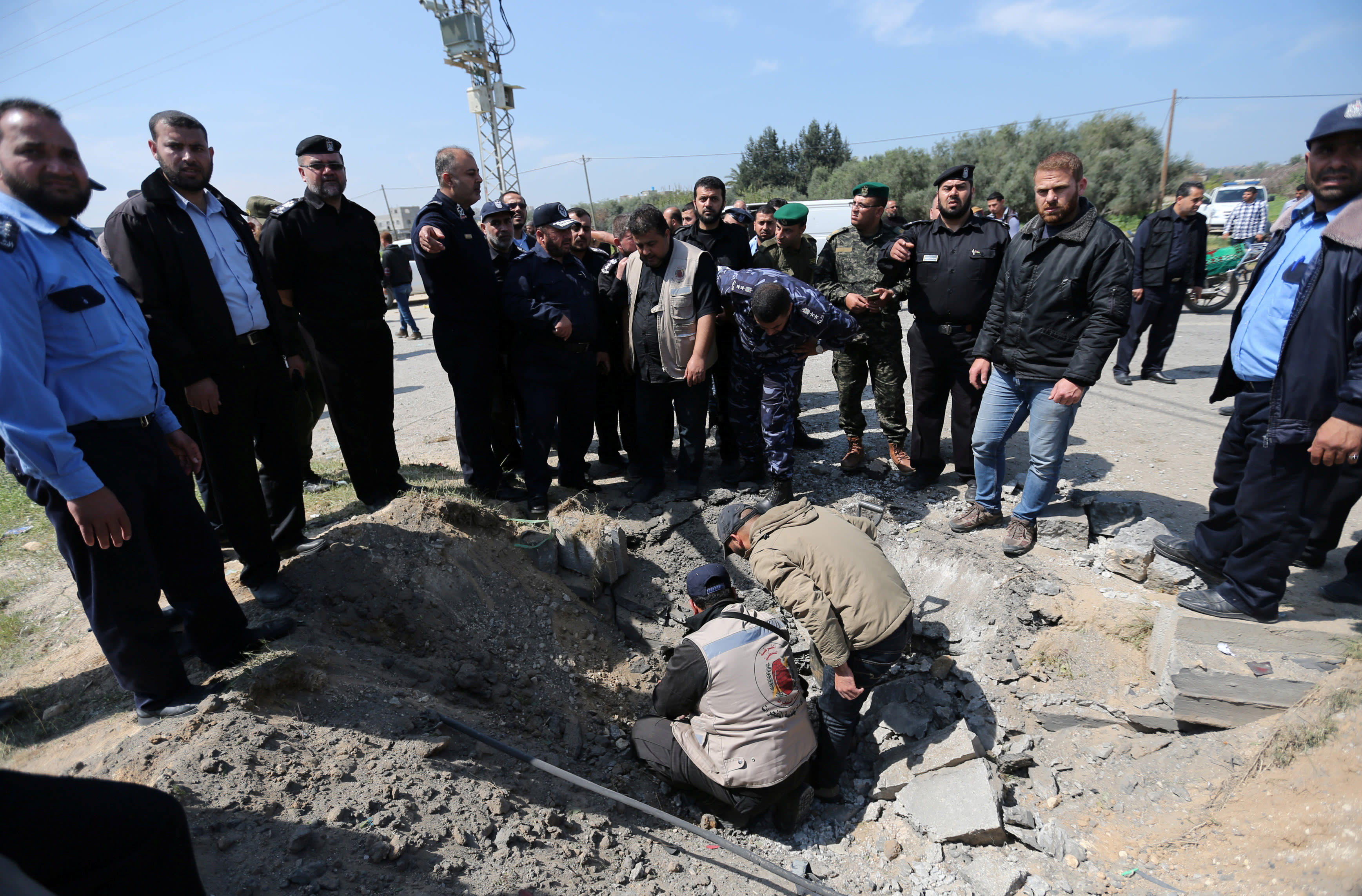 Hamas police chief Tayseer al-Batish inspects the site of an explosion that targeted the convoy of Palestinian Prime Minister Rami Hamdallah, in the northern Gaza Strip (IBRAHEEM ABU MUSTAFA / REUTERS)