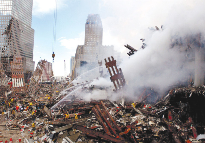 FIRES STILL burn amid the rubble and debris of New York City’s World Trade Center on September 13, 2001, two days after the 9/11 terrorist attacks.Wikimedia Commons