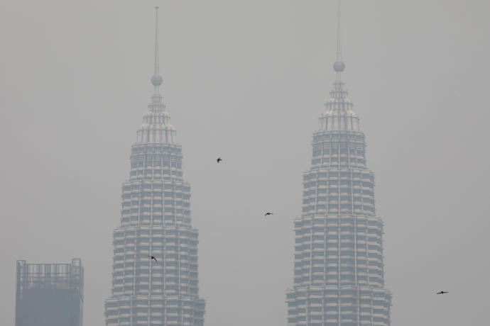 Petronas Twin Towers are shrouded by haze in Kuala Lumpur, Malaysia