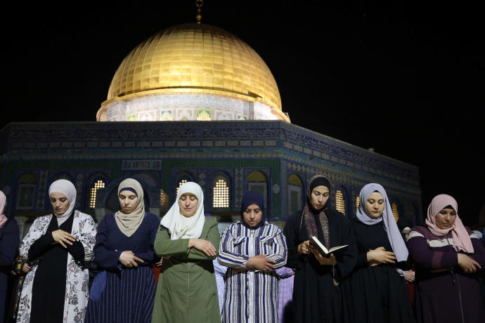 Palestinians pray on Laylat al-Qadr during the holy month of Ramadan, at the compound that houses Al-Aqsa Mosque, known to Muslims as Noble Sanctuary and to Jews as Temple Mount, in Jerusalem's Old City, May 8, 2021 (Credit: REUTERS/AMMAR AWAD)