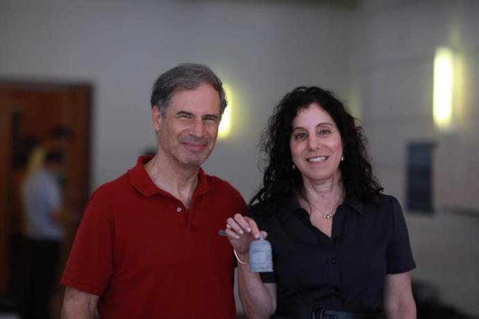 Inbal Kreiss, director of the scientific mission of ‘Rakia’ and director of innovation of the IAI’s Missile and Space Systems Division, and Israel's second-ever astronaut Eitan Stibbe. (Elad Malka) 