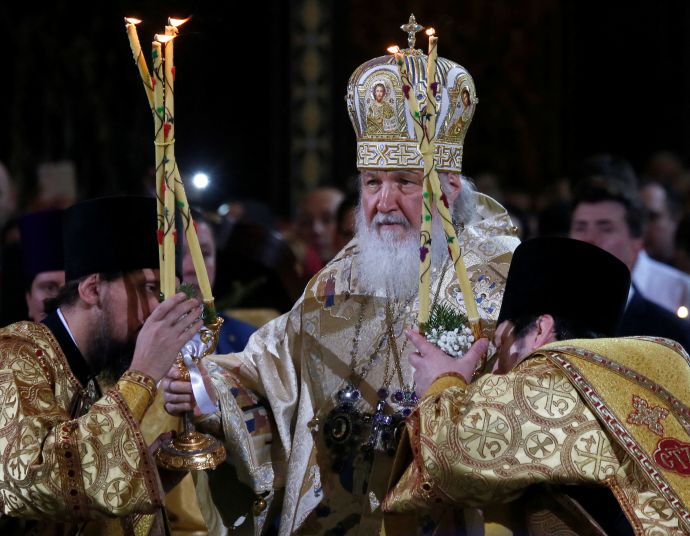 Patriarch Kirill, the head of the Russian Orthodox Church, conducts a service on Orthodox Christmas at the Christ the Saviour Cathedral in Moscow, Russia January 6, 2018. (Credit: MAXIM SHEMETOV/REUTERS)