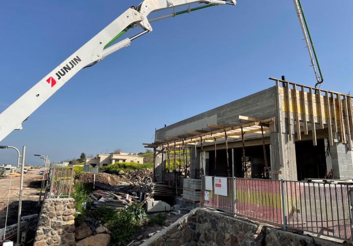 Kibbutz Gonen, located in the Upper Eastern Galilee, and the site of the under construction JNF-USA Galilee Culinary Institute, is developing 50 new home sites with the help of the HDF, like this home under construction. (Credit: JNF-USA)