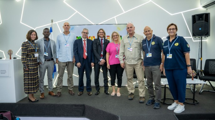 Dr. Gilad Ostrovsky, KKL-JNF Chief Forester (third from right) and KKL-JNF Director of International Relations Karine Bolton (fourth from right) with KKL-JNF delegation and representatives of Italian forestry (Credit: Bradley Dcoutho)