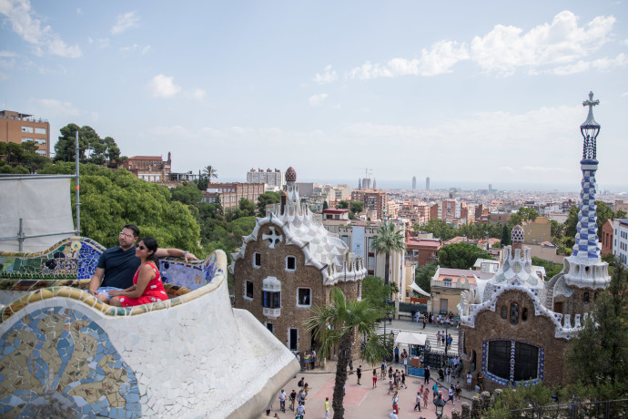 People visit at Park Guell in Barcelona, Spain, on August 18, 2019 (Credit: YONATAN SINDEL/FLASH90)