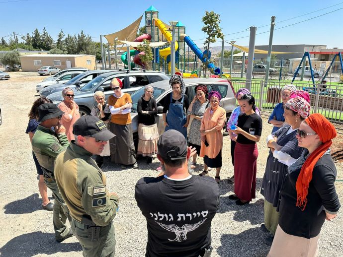 EMERGENCY SURVIVAL Driving instructors with Itamar residents. (Credit: COURTESY SHURAT HADIN)