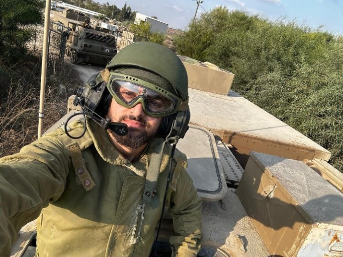 Adiel Cohen on a heavy mechanized transporter in the Gaza envelope in Southern Israel. Cohen was drafted along with almost 300,000 other Israelis to the battle against Hamas in Gaza, (October 17, 2023) (Credit: Adiel Cohen)