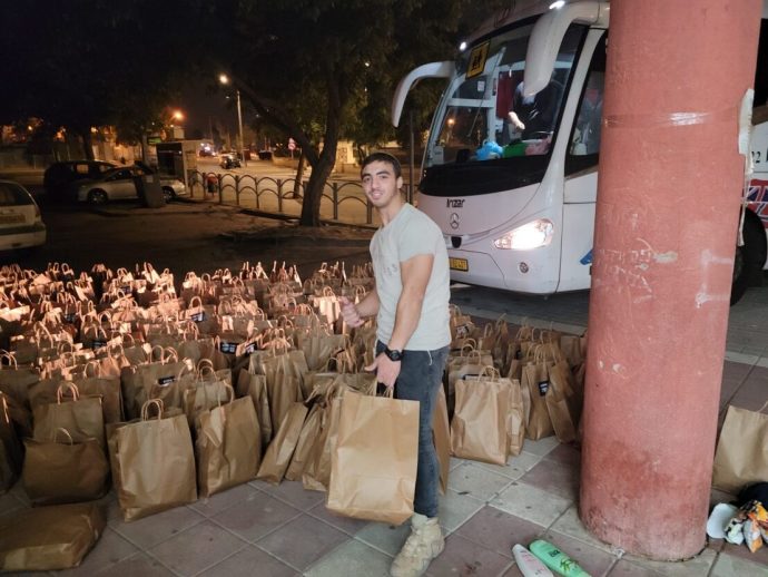 American students at Muss High School arranged care packages for displaced Israelis earlier in October. (Credit: JNF-USA)