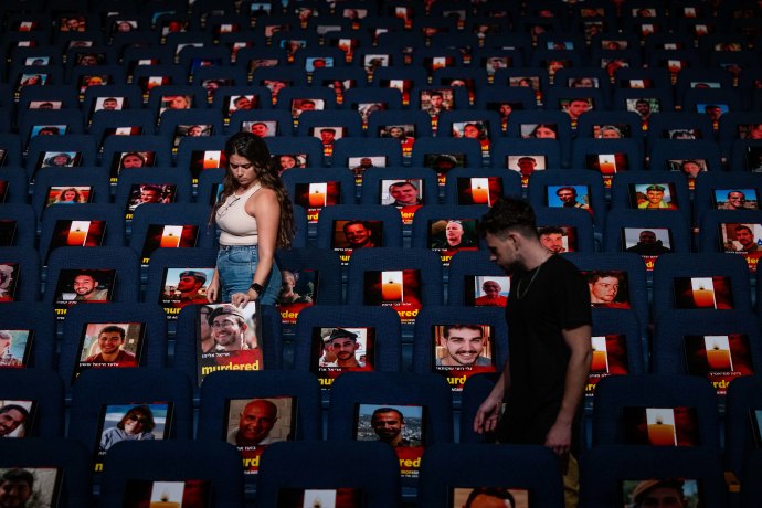 Photos of more than a thousand people abducted, missing or killed in the Hamas terrorist attack on October 7, 2023 in southern Israel, are displayed in the Smolarz Auditorium at Tel Aviv University, on October 22, 2023 (Credit: YONATAN SINDEL/FLASH90)