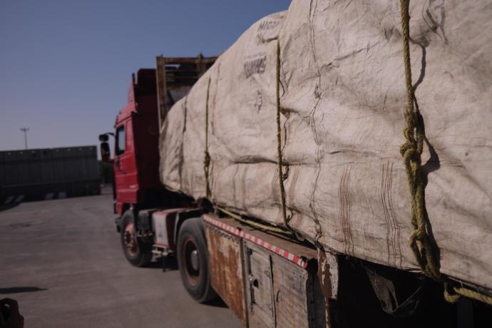 A truck carrying humanitarian aid into Gaza at the Kerem Shalom border crossing, January 2024. (Credit: Courtesy of Hananya Naftali)