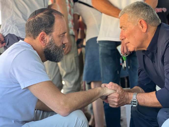 ALMOG VISITING JONATHAN POLIN at shiva observances for son, hostage Hersh Goldberg-Polin, murdered by Hamas in 2024.