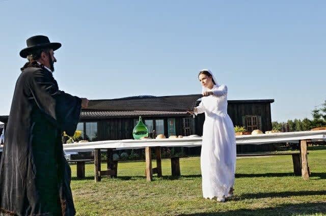 The 'bride' rejoices at the Jewish wedding recreation in Radzanow. (credit: JONNY DANIELS)