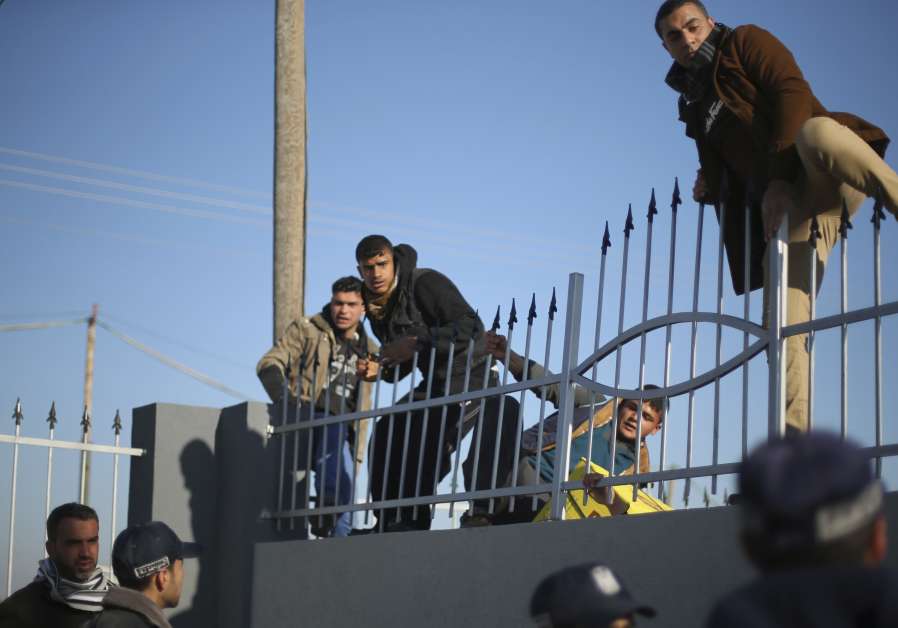 Palestinians attempt to flee Gaza for Egypt at the Rafah crossing.
