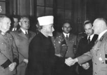 HAJ AMIN AL-HUSSEINI greets a WW2 Nazi official
