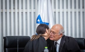  Supreme Court Chief of Justice Ester Hayut with Supreme Court judge George Karra and Supreme court justices at a ceremony held for outgoign Supreme Court judge George Karra, at the Supreme Court in Jerusalem on May 29, 2022.
