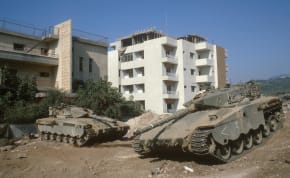  IDF TANKS park near houses in Tyre, South Lebanon, July 1982. 