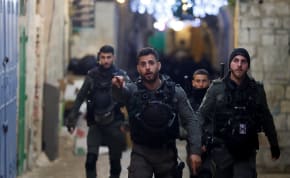  Israeli police walk near a security incident scene near the compound known to Muslims as Al-Aqsa or the Noble Sanctuary and to Jews as the Temple Mount, in Jerusalem's Old City, April 1, 2023. 
