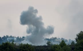  Smoke rises after Israeli shelling , as seen from Lebanese side, near the border with Israel, in Alma Al-Shaab, southern Lebanon, October 13, 2023