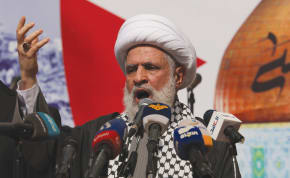  HEZBOLLAH DEPUTY leader Sheikh Naim Qassem speaks in Beirut, at a rally supporting Palestinians in Gaza