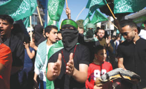  PALESTINIANS WAVE Hamas flags in the West Bank in solidarity with Gaza. Calls to restore the PA as the governing entity in Gaza are no less naïve than calls for a ‘two-state solution,’ argues the writer.