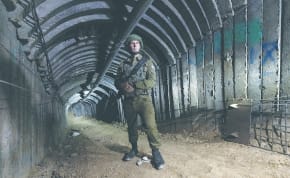 IDF SPOKESMAN Rear Admiral Daniel Hagari stands in a Hamas terror tunnel in the northern Gaza Strip, earlier this month. There must be a process that results in no terror tunnels, no terror leaders, no anti-Israel brainwashing in schools, no terror training, and no weapons, the writer asserts.