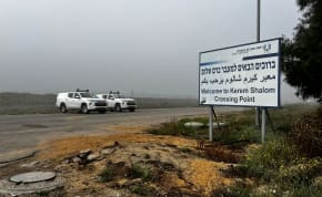  Security vehicles are seen near the Kerem Shalom crossing in southern Israel, February 25, 2024
