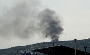  Black smoke rises from a site believed to have been hit by an Israeli strike, in southern Lebanon, in this screen grab taken from a video, February 27, 2024.
