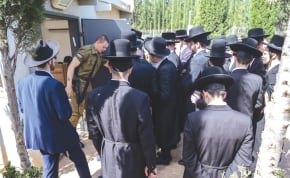  Haredim arrive at the IDF recruitment center in Tel Hashomer to process their draft exemptions.