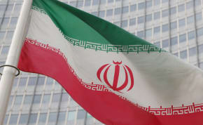   The Iranian flag flutters outside the International Atomic Energy Agency (IAEA) headquarters in Vienna, Austria, March 6, 2023. 