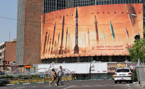  An anti-Israel billboard with a picture of Iranian missiles is seen on a street in Tehran, Iran April 19, 2024.