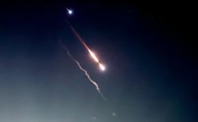  Missiles fired at Israel are seen in the sky over Amman, Jordan on April 14, 2024, in this screen grab obtained from a social media video. 