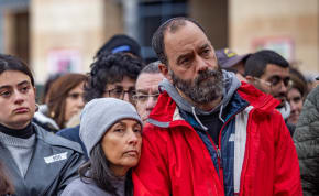  Parents of Israeli hostage Hersh Goldberg-Polin and others attend a rally for hostages marking 100 days since the start of the war between Israel and Hamas, outside the Jerusalem Municipality on January 14, 2024