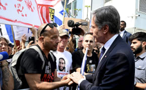  US Secretary of State Antony J. Blinken engages with family members and demonstrators at a Tel Aviv protest for the release of hostages, May 1, 2024