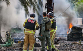  Israeli security forces at the scene where a rocket fired from Lebanon into Northern Israel hit the northern Israeli city of Kiryat Shmona, May 5, 2024