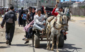  People flee the eastern parts of Rafah after the Israeli military began evacuating Palestinian civilians, May 6, 2024