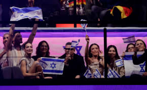  Eden Golan, from Israel, waves a flag during the Grand Final of the 2024 Eurovision Song Contest, in Malmo, Sweden, May 11, 2024.