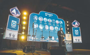 MOTI LEITNER, a Beit Shemesh City Council member, addresses a Beit Shemesh Remembrance Day ceremony on Sunday night. 
