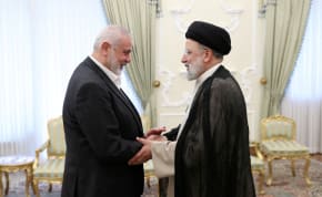  Iranian President Ebrahim Raisi meets with Palestinian group Hamas' top leader, Ismail Haniyeh, in Tehran, Iran March 27, 2024.
