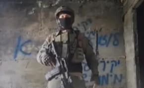  Masked soldier or reservist under investigation by the IDF for encouraging rebellion against Gallant and Halevi.